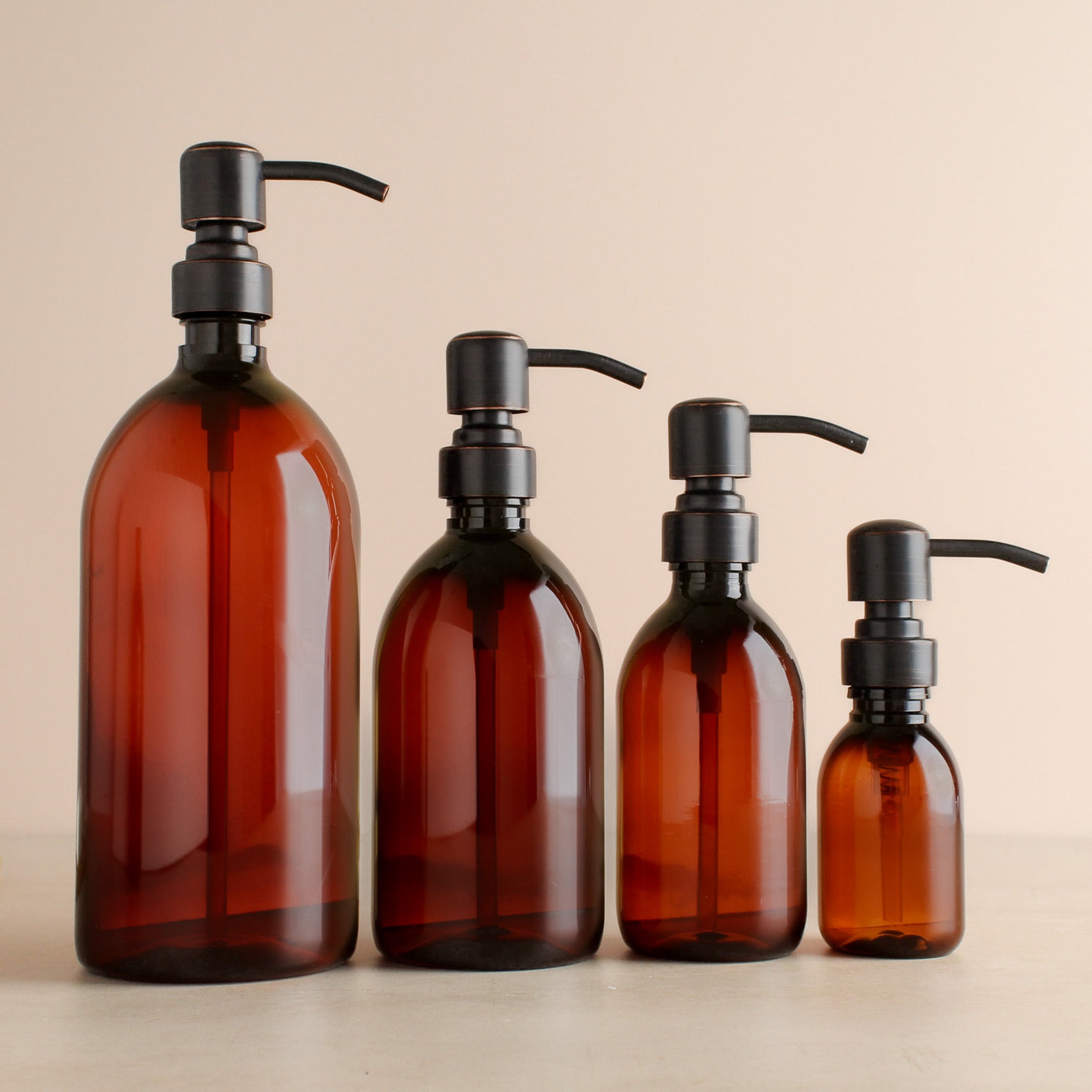 Amber Plastic Dispenser Bottle With Black/Copper Pump - Namie Home