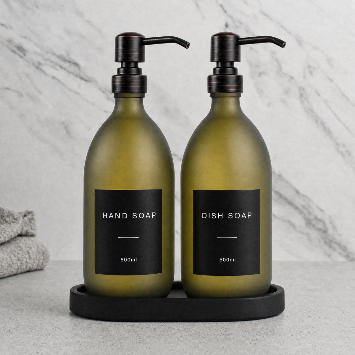 Black Tray & Frosted Green Glass Hand Soap & Dish Soap Set on a black stone tray, black and copper pumps
