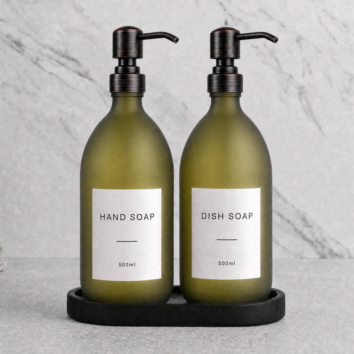Black Tray & Frosted Green Glass Hand Soap & Dish Soap Set on a black stone tray, black and copper pumps
