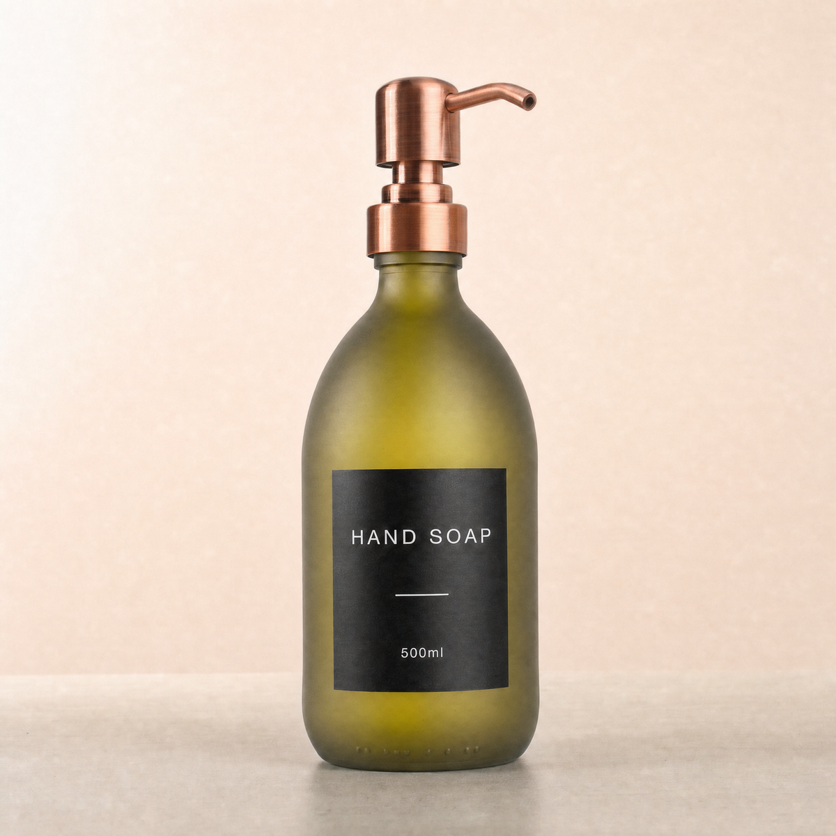 Labelled Frosted Green Glass Dispenser, rose gold pump