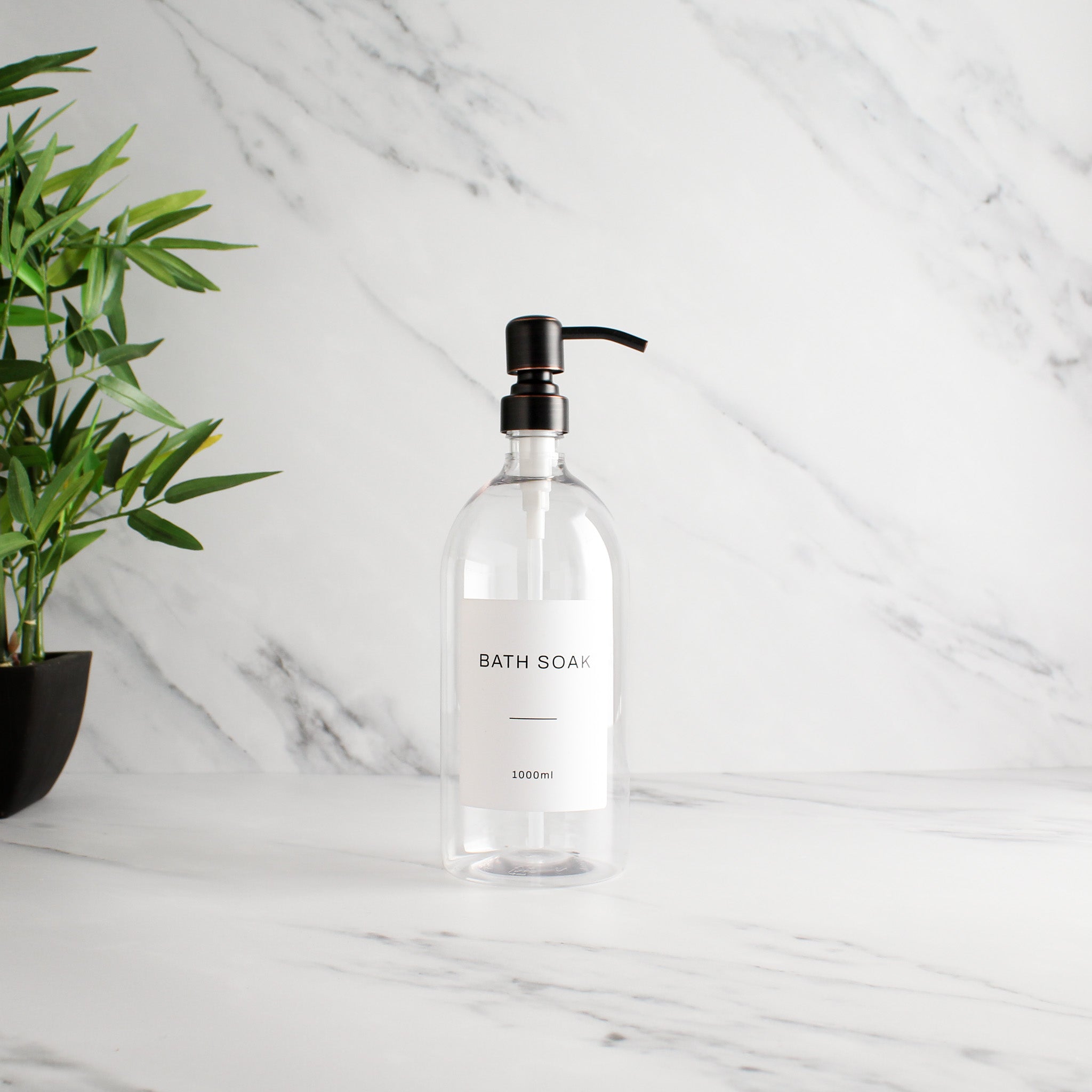 Labelled Clear Plastic Dispenser Bottle With Black/Copper Pump - Namie Home