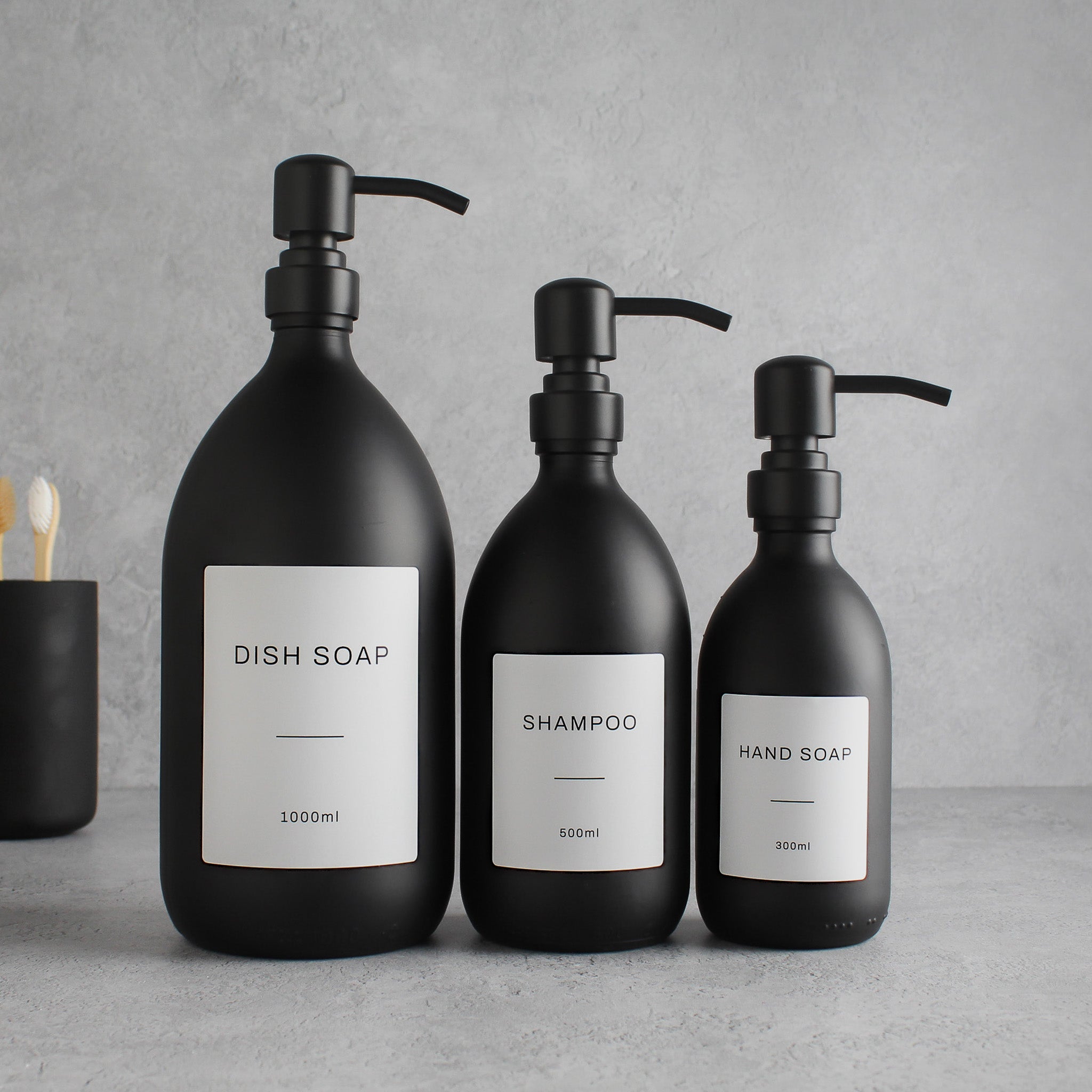 Labelled Matte Black Glass Dispenser Bottle With Matte Black Pump - Namie Home