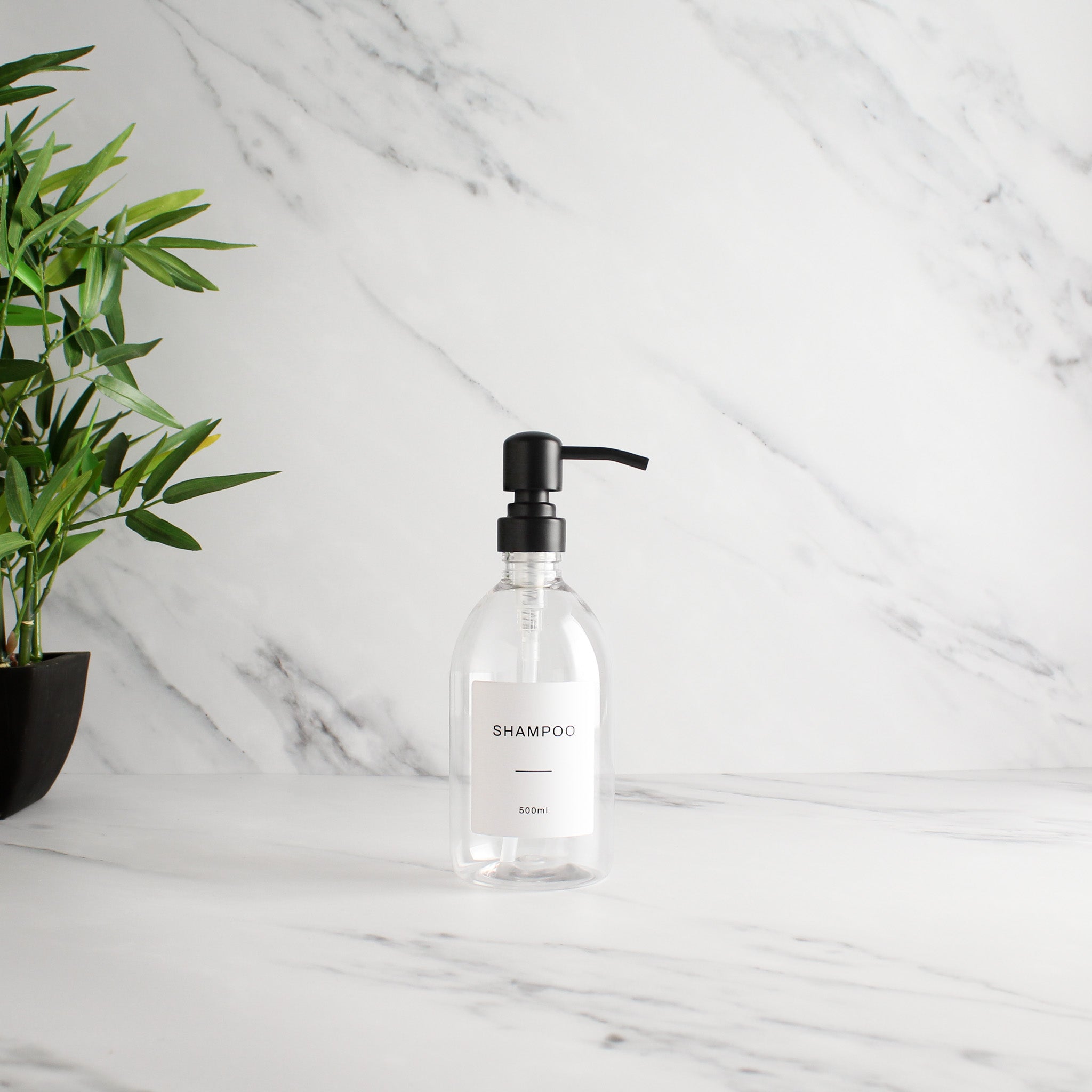 Labelled Clear Plastic Dispenser Bottle With Matte Black Pump - Namie Home