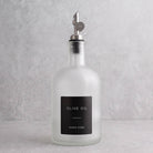 Frosted White Glass Tall Neck Oil Bottle With Label - silver lid