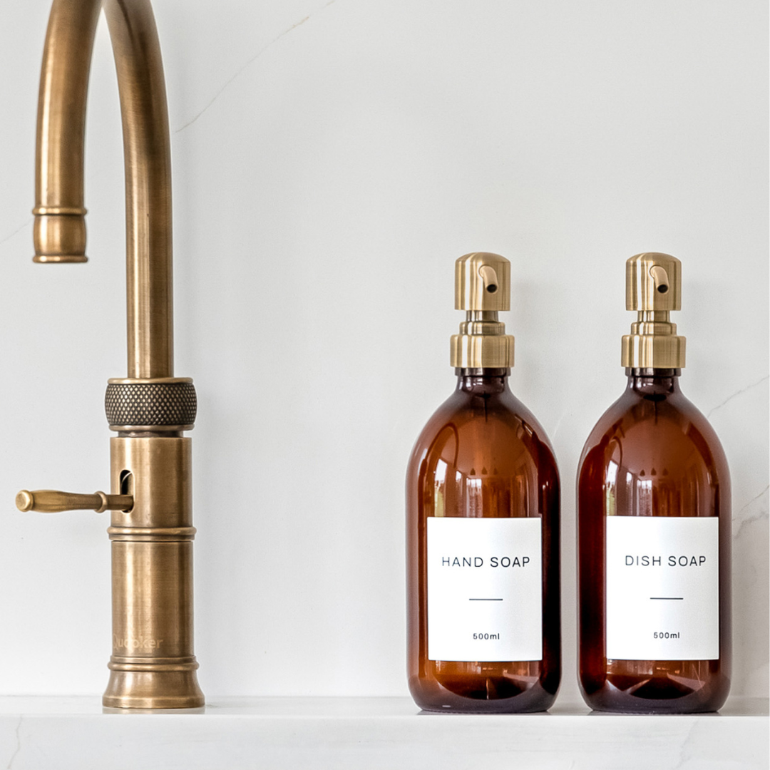 Labelled Amber Glass Dispenser Bottle With Gold Pump