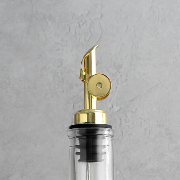 Clear Glass Tall Neck Oil Bottle With Label