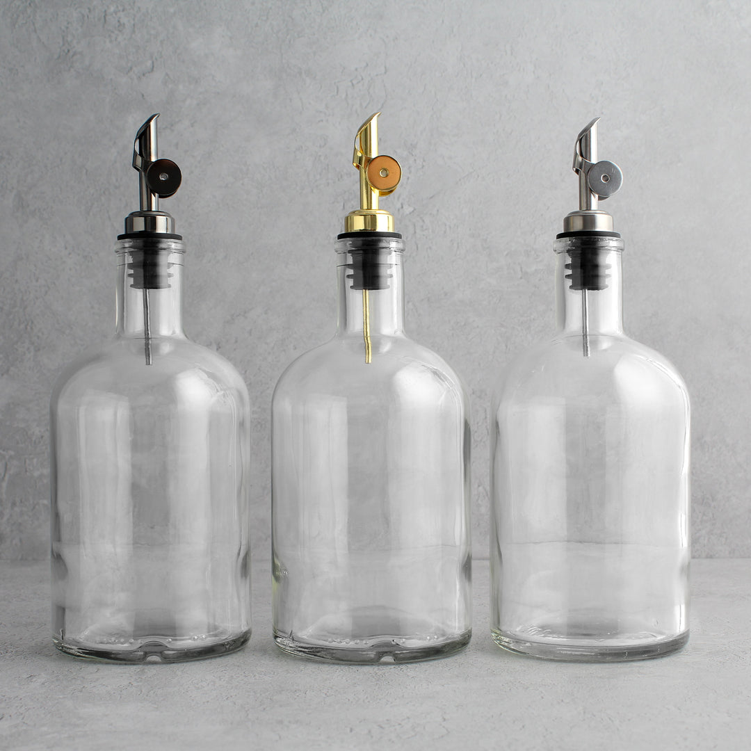 Clear Glass Tall Neck Oil Bottle With Label