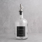 Clear Glass Tall Neck Oil Bottle With Label - silver lid