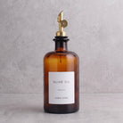 Amber glass oil bottle with gold lid