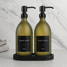 Black Tray & Frosted Green Glass Hand Soap & Dish Soap Set on a black stone tray, matte black pumps