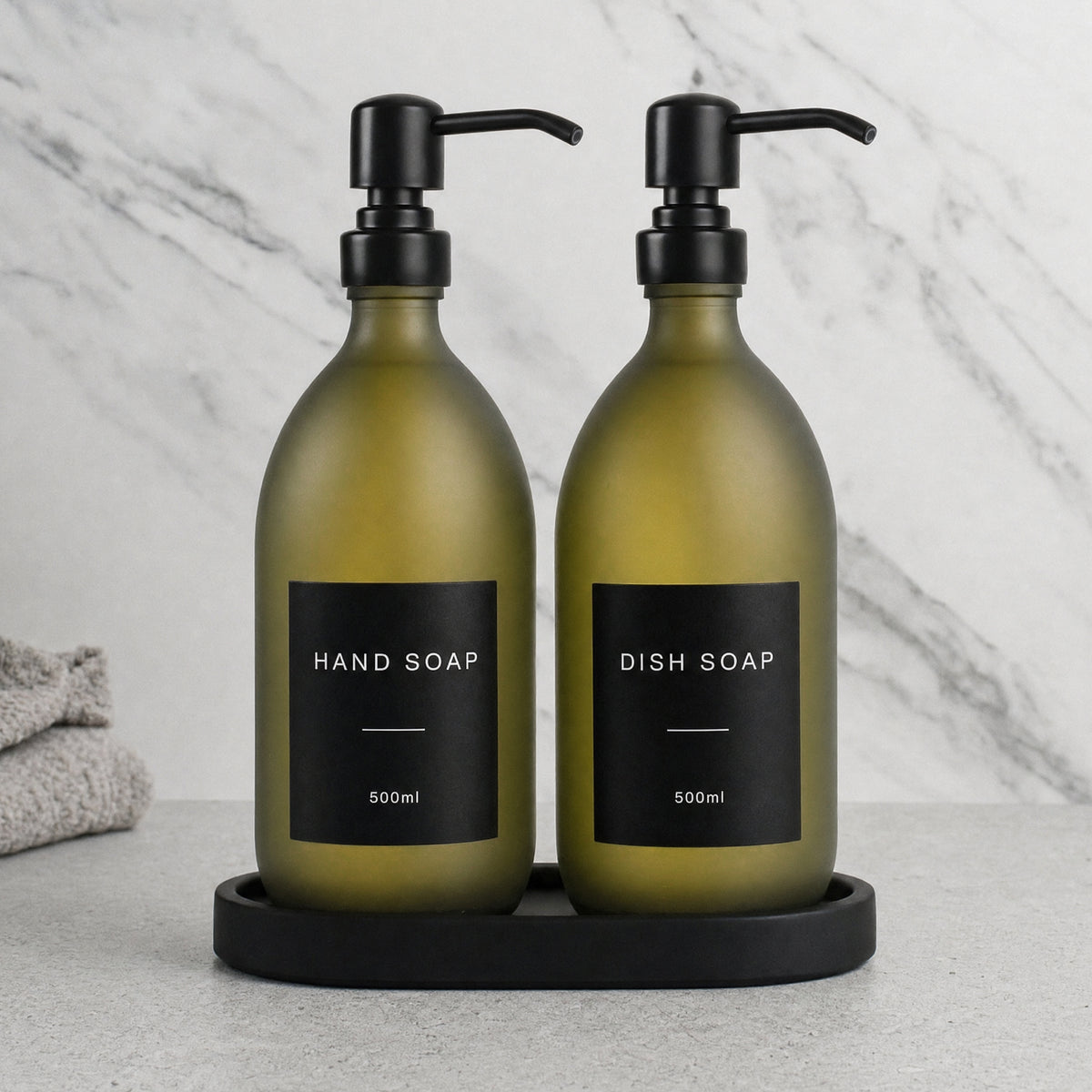 Black Tray & Frosted Green Glass Hand Soap & Dish Soap Set on a black stone tray, matte black pumps