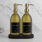 Black Tray & Frosted Green Glass Hand Soap & Hand Cream Set on a black stone tray, gold pumps