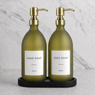 Black Tray & Frosted Green Glass Hand Soap & Dish Soap Set on a black stone tray, gold pumps