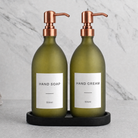 Black Tray & Frosted Green Glass Hand Soap & Hand Cream Set on a black stone tray, rose gold pumps