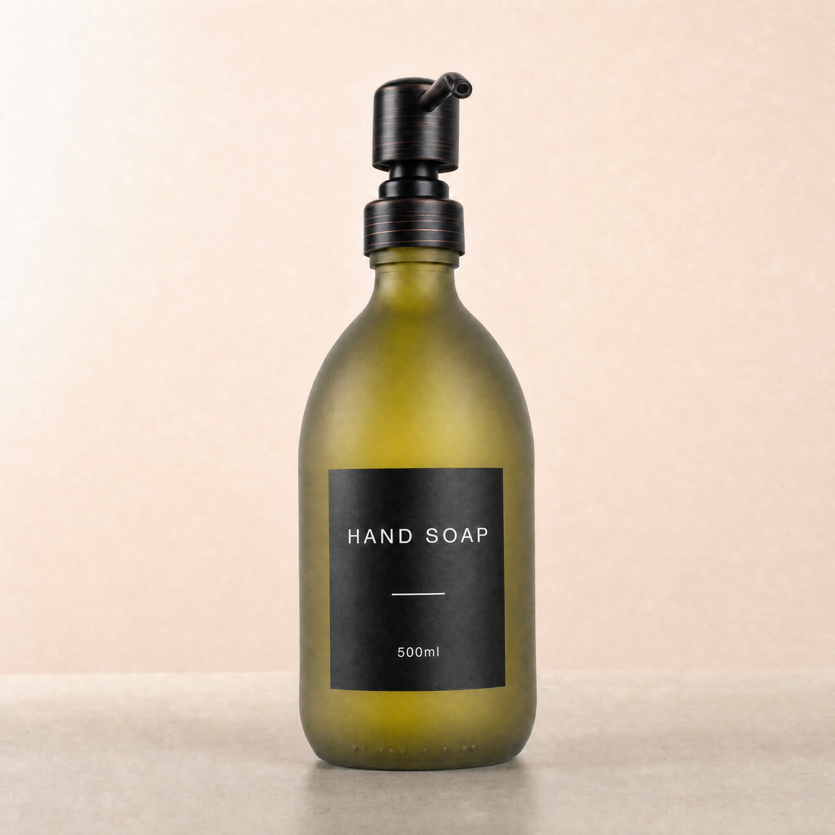 Labelled Frosted Green Glass Dispenser, black and copper pump