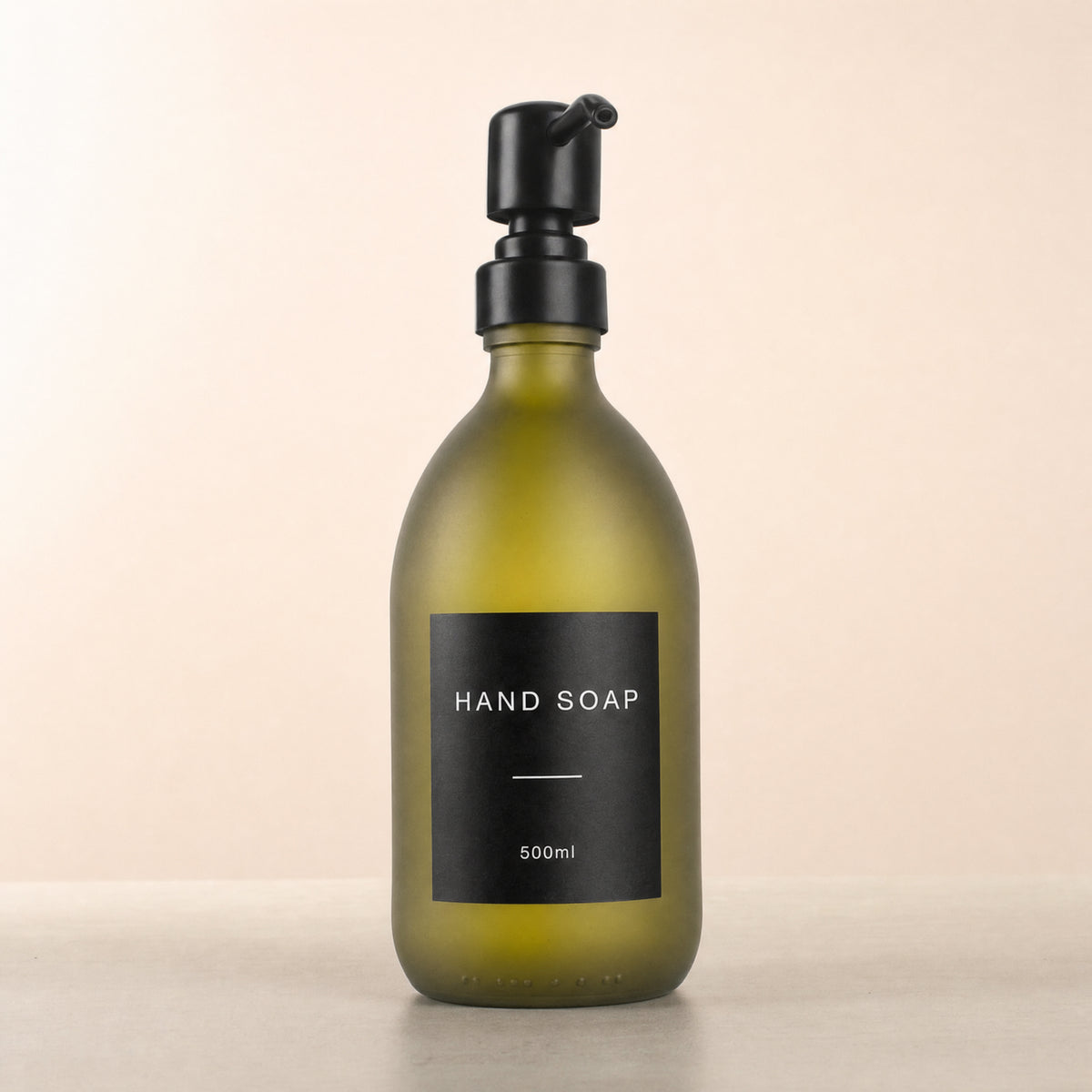 Labelled Frosted Green Glass Dispenser, matte black pump