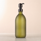 Frosted Green Glass Dispenser, black and copper pump