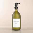 Labelled Frosted Green Glass Dispenser, black and copper pump