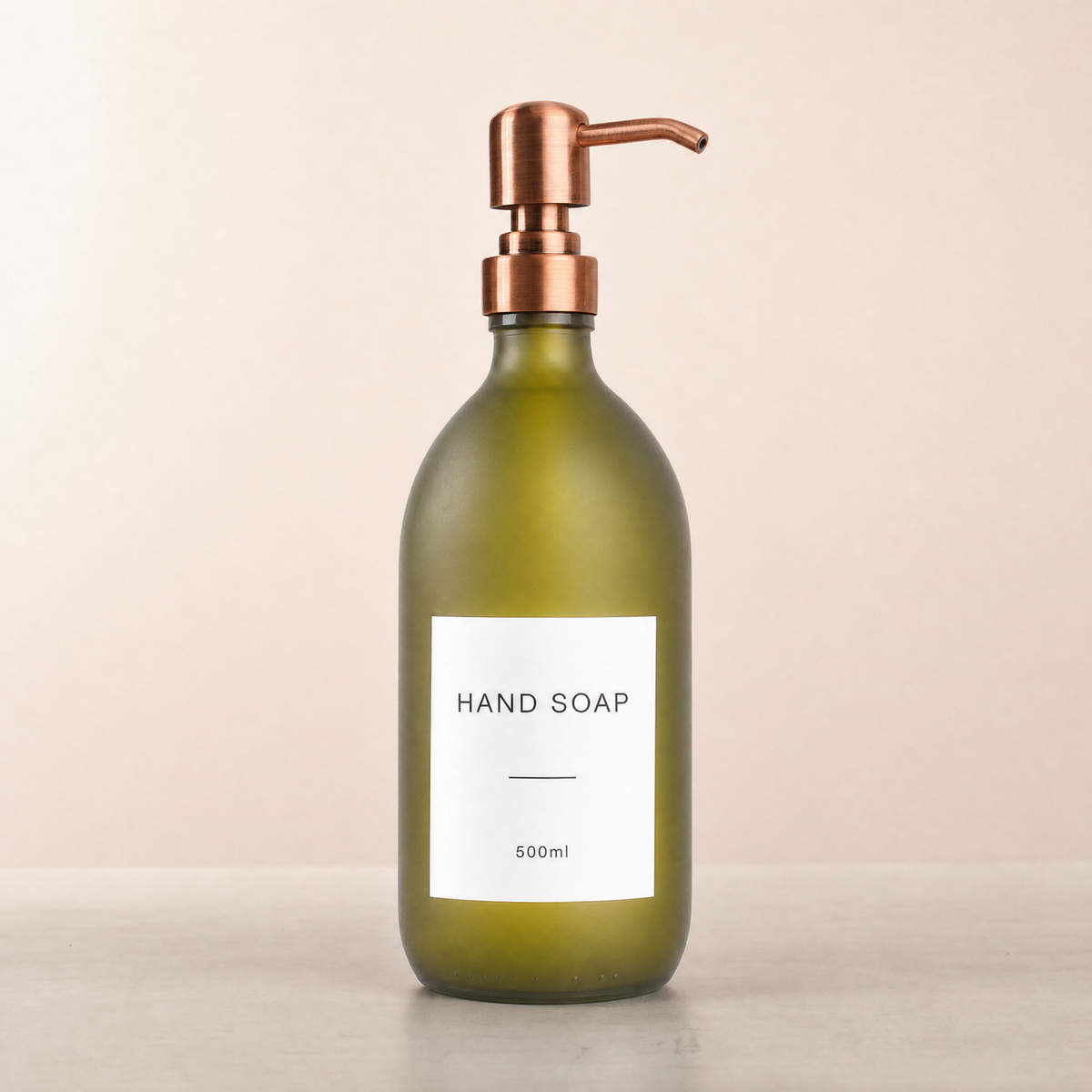Labelled Frosted Green Glass Dispenser, rose gold pump
