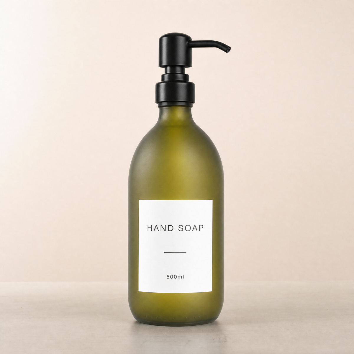 Labelled Frosted Green Glass Dispenser, matte black pump