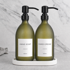 White Tray & Frosted Green Glass Hand Soap & Hand Cream Set on a white stone tray, matte black pumps