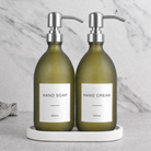 White Tray & Frosted Green Glass Hand Soap & Hand Cream Set on a white stone tray, silver pumps