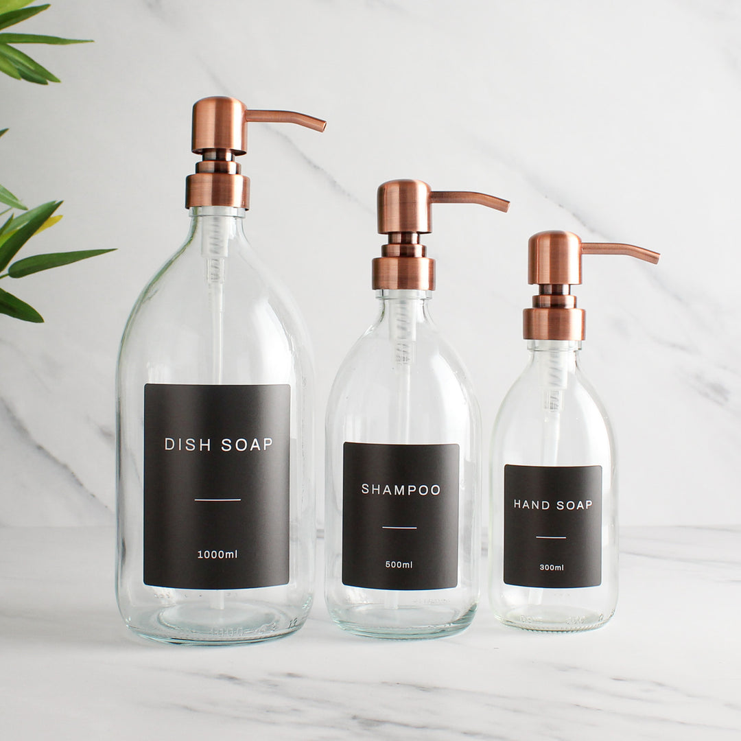 Labelled Clear Glass Dispenser Bottle With Rose Gold Pump