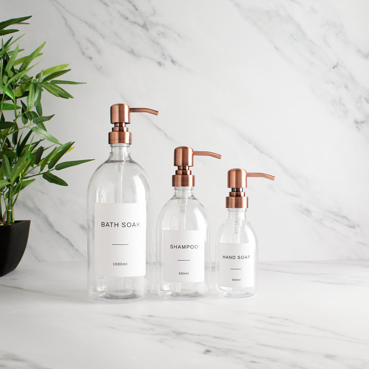 Labelled Clear Plastic Dispenser Bottle With Rose Gold Pump