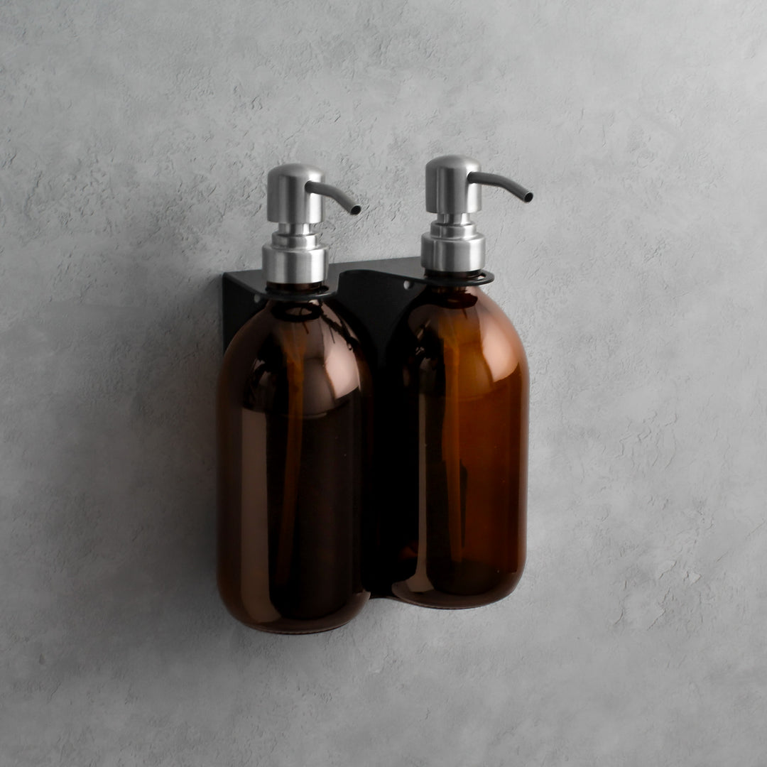 Amber glass soap dispenser bottle set on metal wall mounted bracket for hand soap and hand cream for hotels, home, spas, cafe, restaurant, b&b