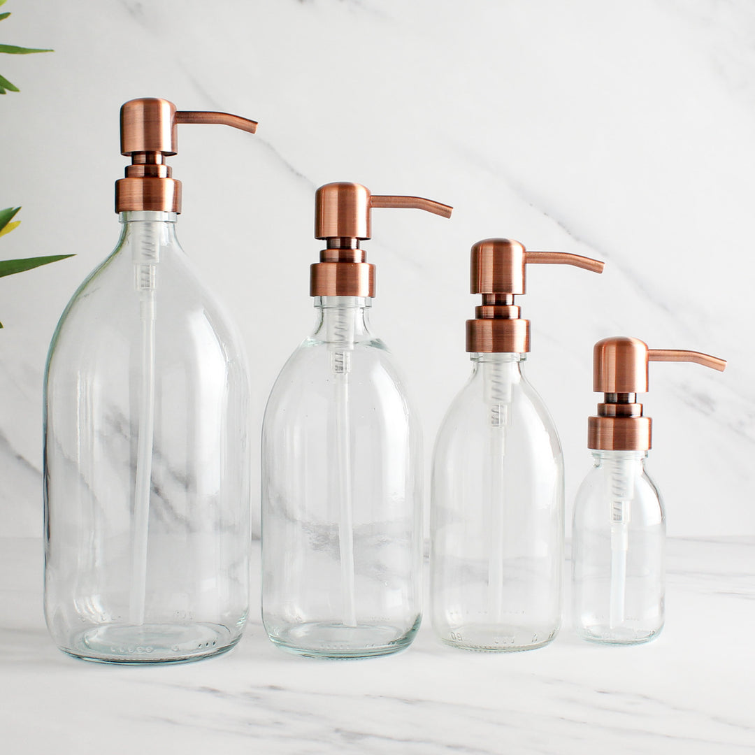 Clear Glass Dispenser Bottle With Rose Gold Pump