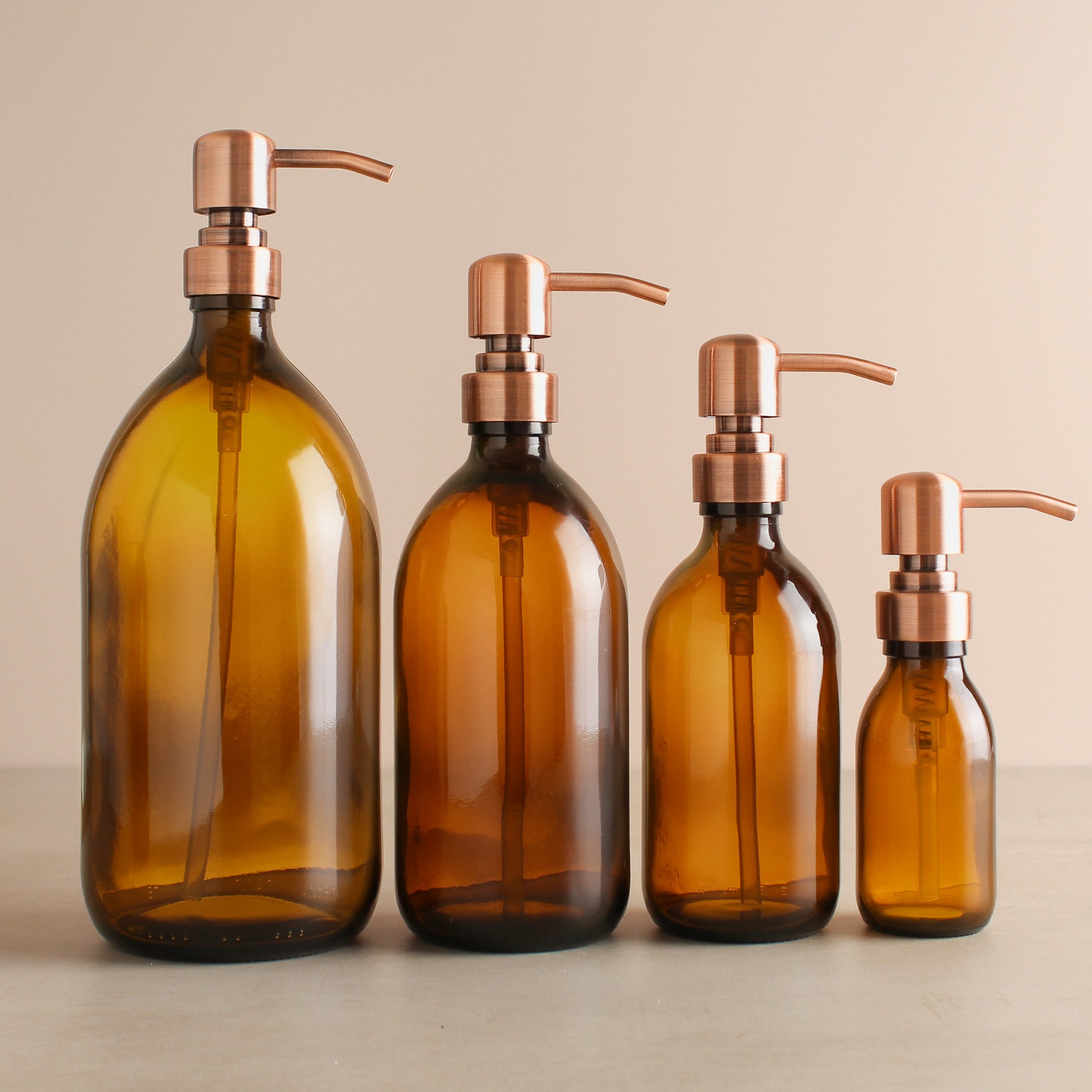 Amber Glass Dispenser Bottle With Rose Gold Pump - Namie Home