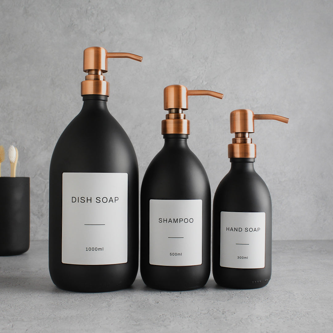 Labelled Matte Black Glass Dispenser Bottle With Rose Gold Pump