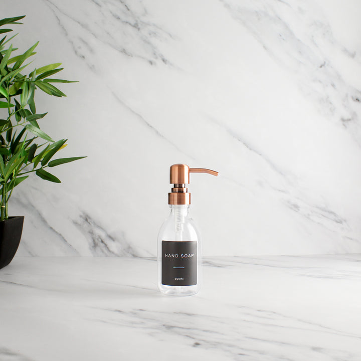 Labelled Clear Plastic Dispenser Bottle With Rose Gold Pump