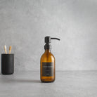 Labelled Amber Glass Dispenser Bottle With Matte Black Pump - Namie Home