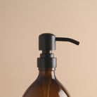 Labelled Amber Glass Dispenser Bottle With Matte Black Pump - Namie Home