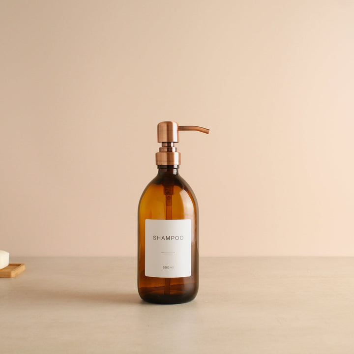 Labelled Amber Glass Dispenser Bottle With Rose Gold Pump - Namie Home