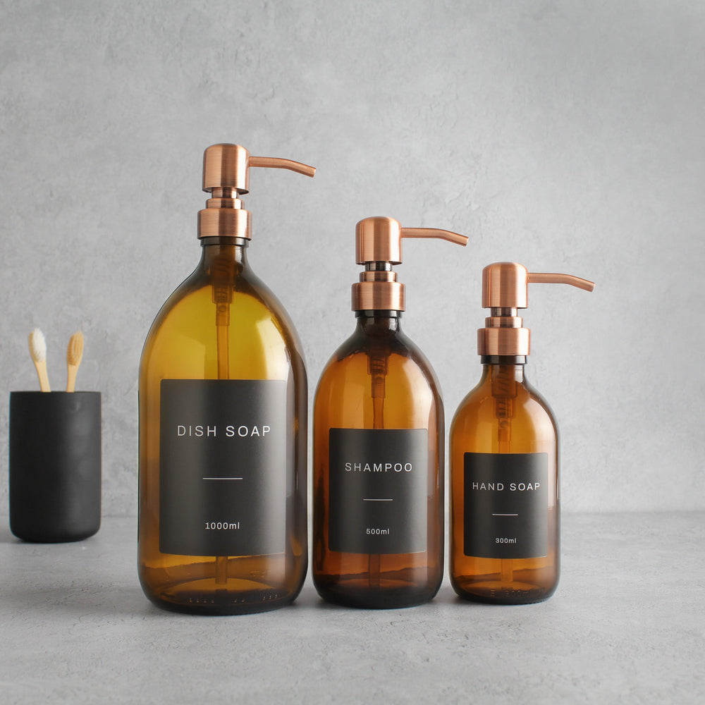 Labelled Amber Glass Dispenser Bottle With Rose Gold Pump - Namie Home