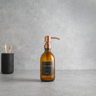 Labelled Amber Glass Dispenser Bottle With Rose Gold Pump - Namie Home