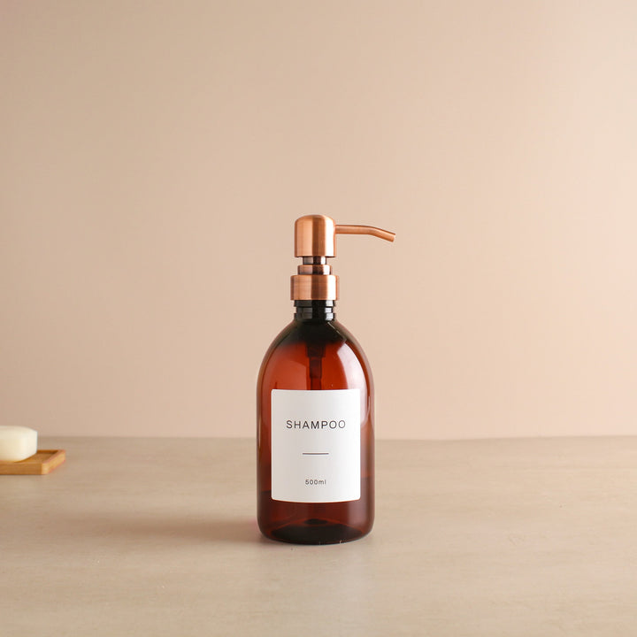 Labelled Amber Plastic Dispenser Bottle With Rose Gold Pump - Namie Home