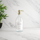 Labelled Clear Glass Dispenser Bottle With Gold Pump - Namie Home