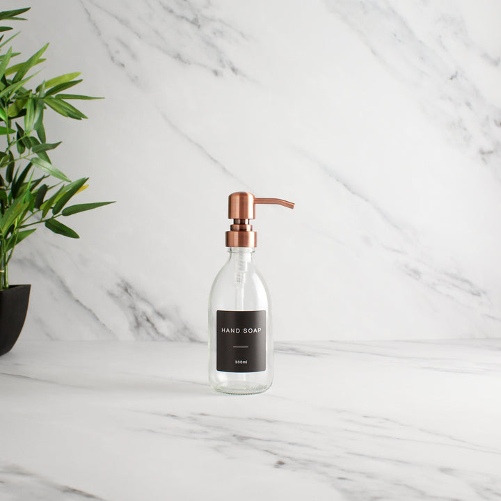 Labelled Clear Glass Dispenser Bottle With Rose Gold Pump - Namie Home