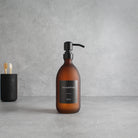 Labelled Frosted Amber Glass Dispenser Bottle With Matte Black Pump - Namie Home