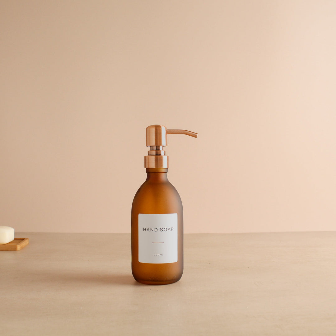 Labelled Frosted Amber Glass Dispenser Bottle With Rose Gold Pump - Namie Home