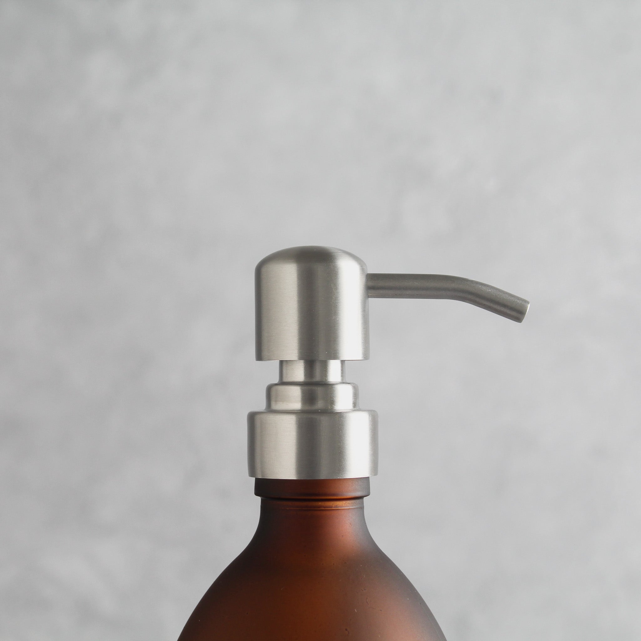 Labelled Frosted Amber Glass Dispenser Bottle With Silver Pump - Namie Home