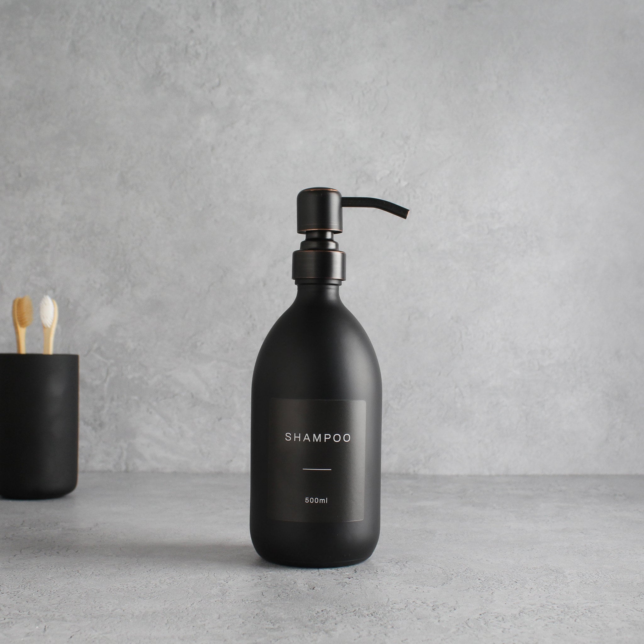 Labelled Matte Black Glass Dispenser Bottle With Black/Copper Pump - Namie Home