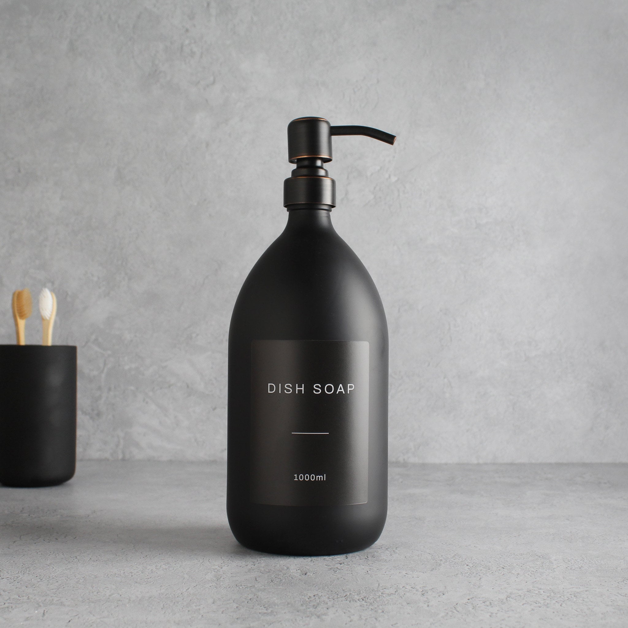 Labelled Matte Black Glass Dispenser Bottle With Black/Copper Pump - Namie Home