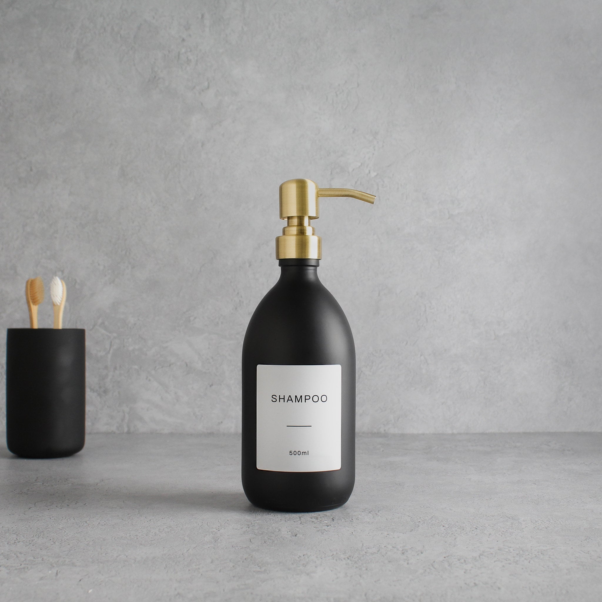 Labelled Matte Black Glass Dispenser Bottle With Gold Pump - Namie Home