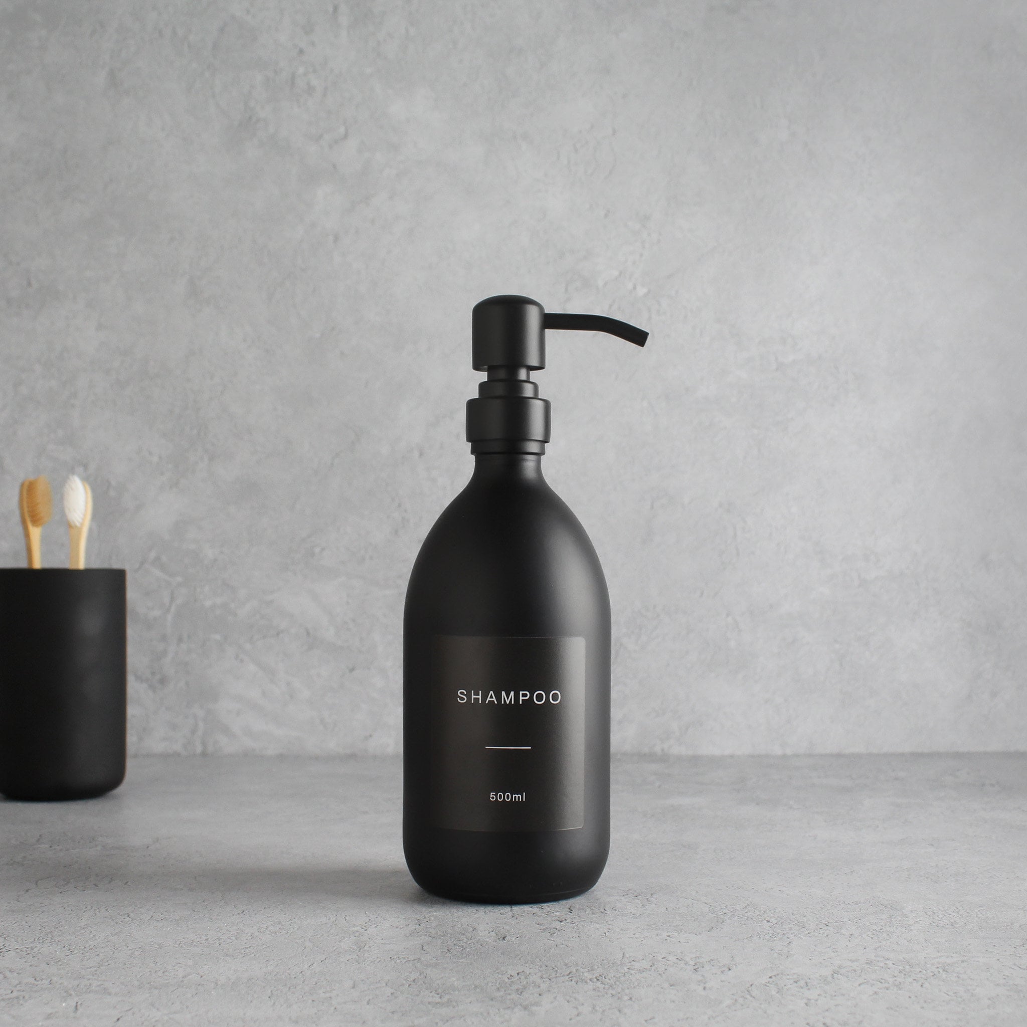 Labelled Matte Black Glass Dispenser Bottle With Matte Black Pump - Namie Home