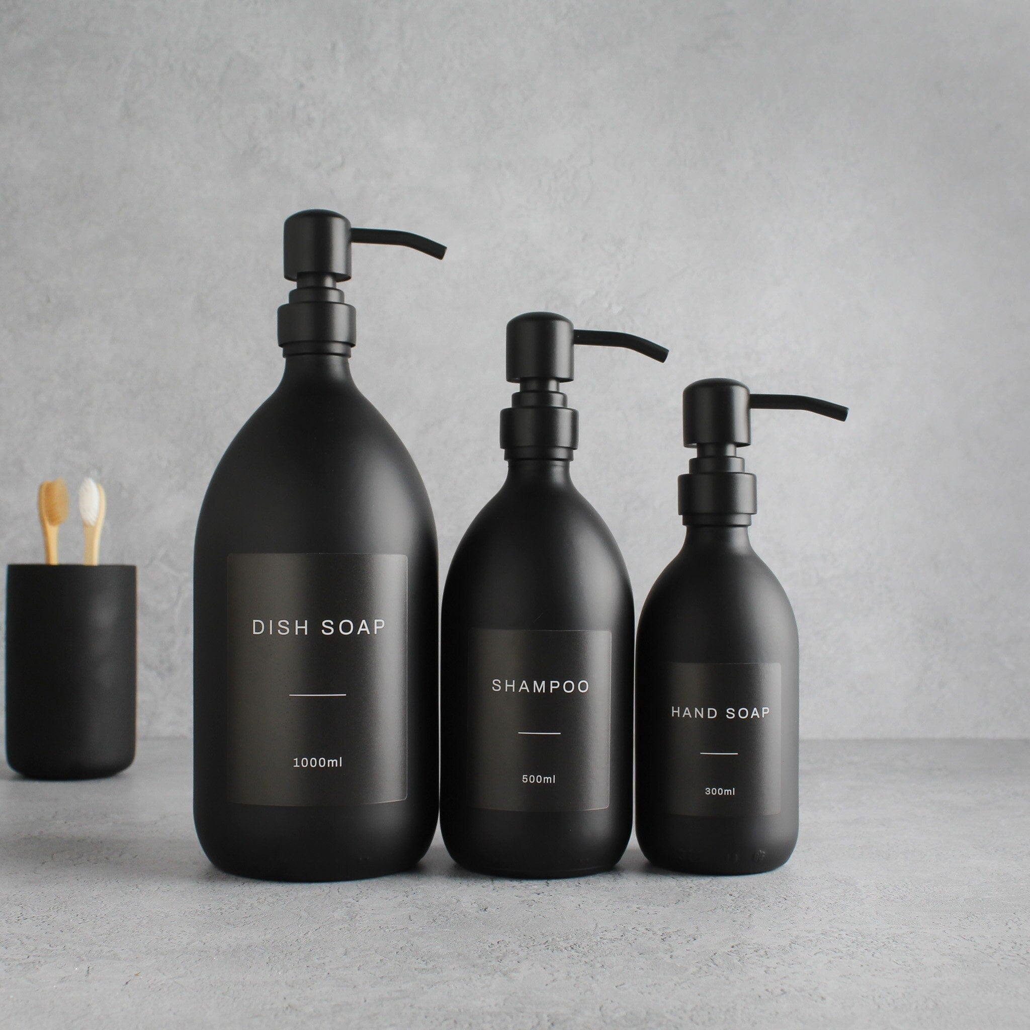 Black 2024 shampoo bottles