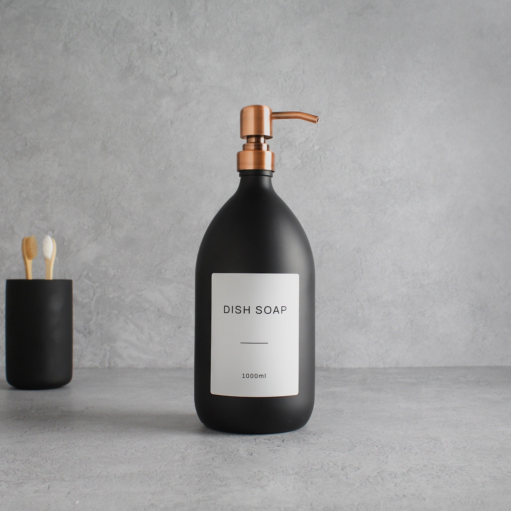 Labelled Matte Black Glass Dispenser Bottle With Rose Gold Pump - Namie Home